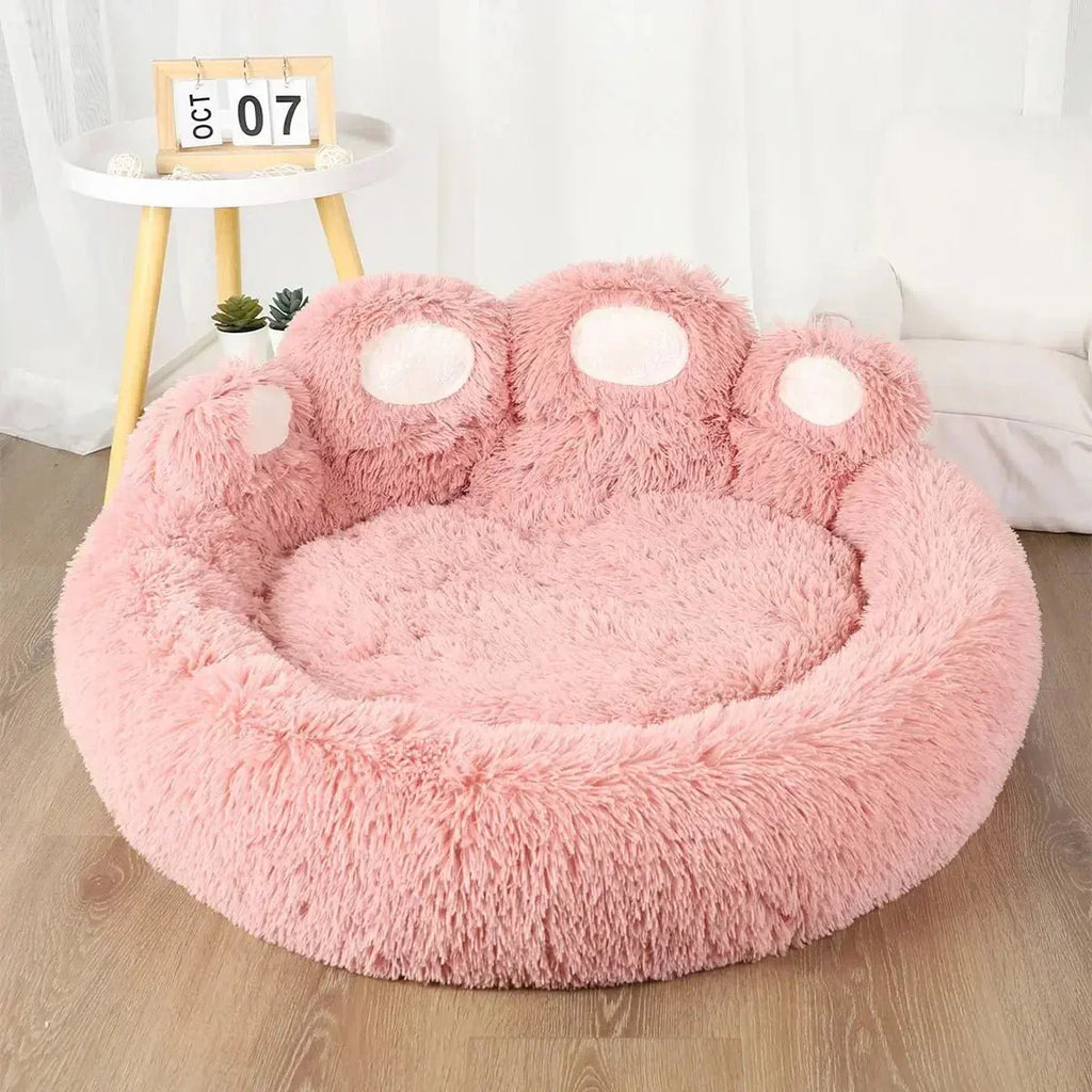 Cama rosa fofa em formato de pata para pets, ideal para conforto e descanso